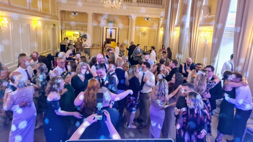 DJ Gary Sulter and a party crowd for a Norfolk wedding at the Assembly house in Norwich